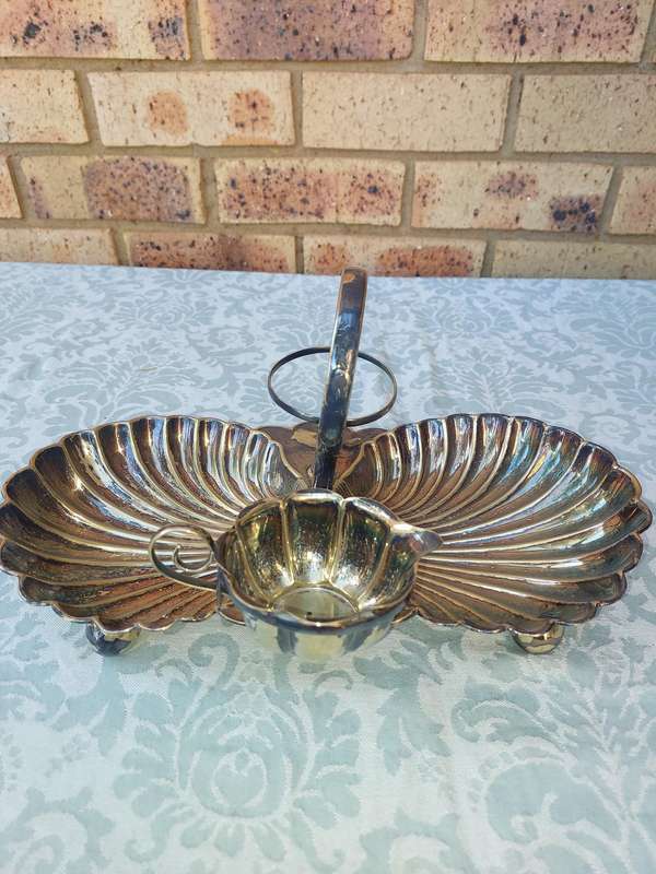A VINTAGE BRIDAL BAROQUE SERVER FOOTED SOLD AS IS