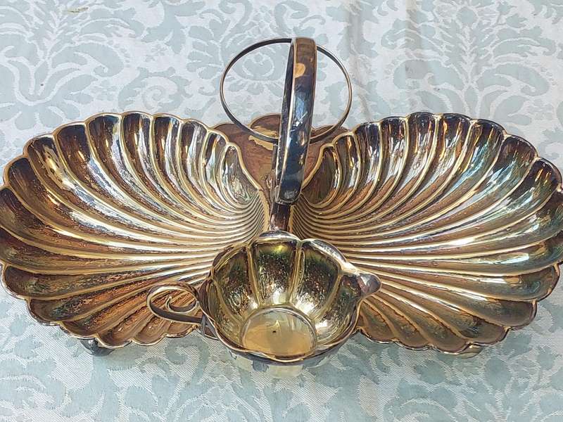A VINTAGE BRIDAL BAROQUE SERVER FOOTED SOLD AS IS