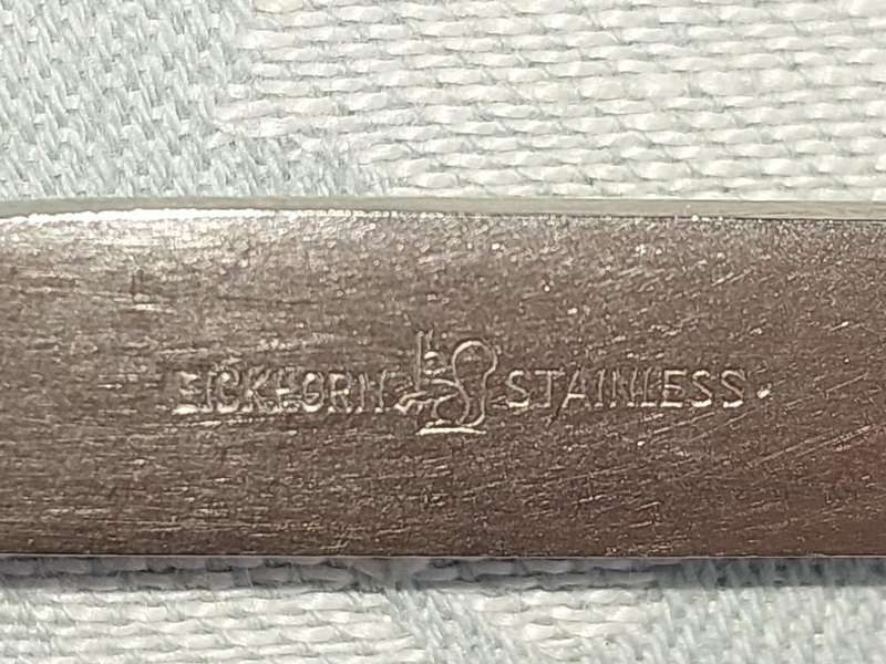 A SET OF VINTAGE GERMAN STAINLESS STEEL CUTLERY SOLD AS IS