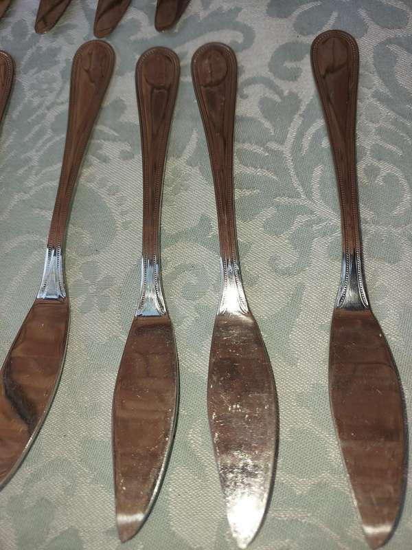 A COLLECTION OF EETRITE STAINLESS STEEL BEAD KNIVES SOLD AS IS