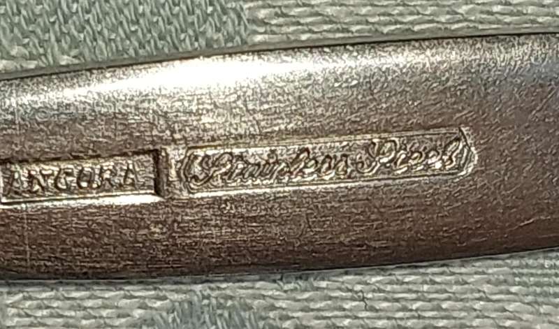 A SET OF ANGORA STAINLESS STEEL MADE IN ENGLAND DESERT FORKS SOLD AS IS R350