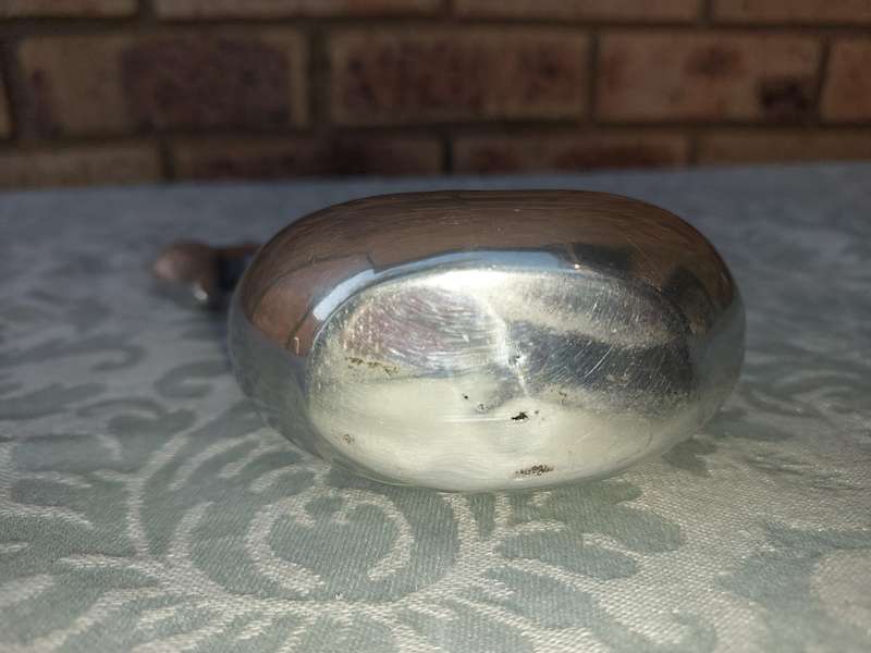 A BEAUTIFULL PEWTEL SWAN SCULPTURE SOLD AS IS