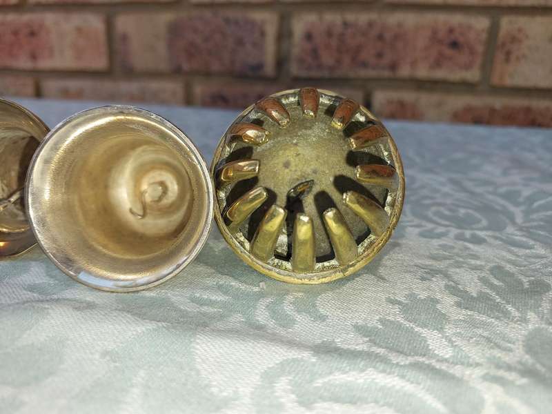 A COLLECTION OF BELLS SOLD AS IS