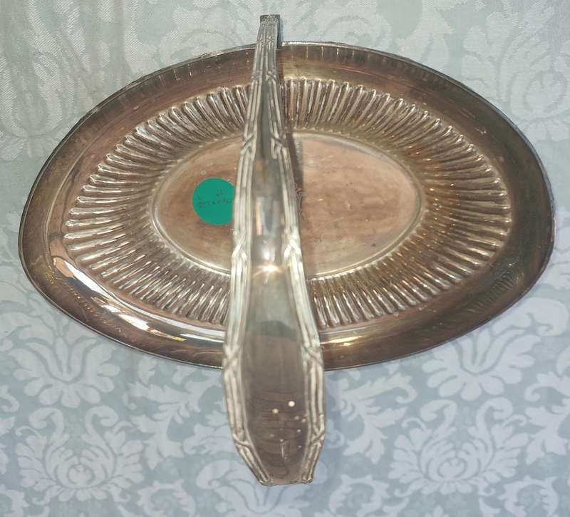 A vintage silver plated bon bon serving tray  with a handle sold as is