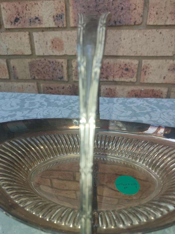 A vintage silver plated bon bon serving tray  with a handle sold as is
