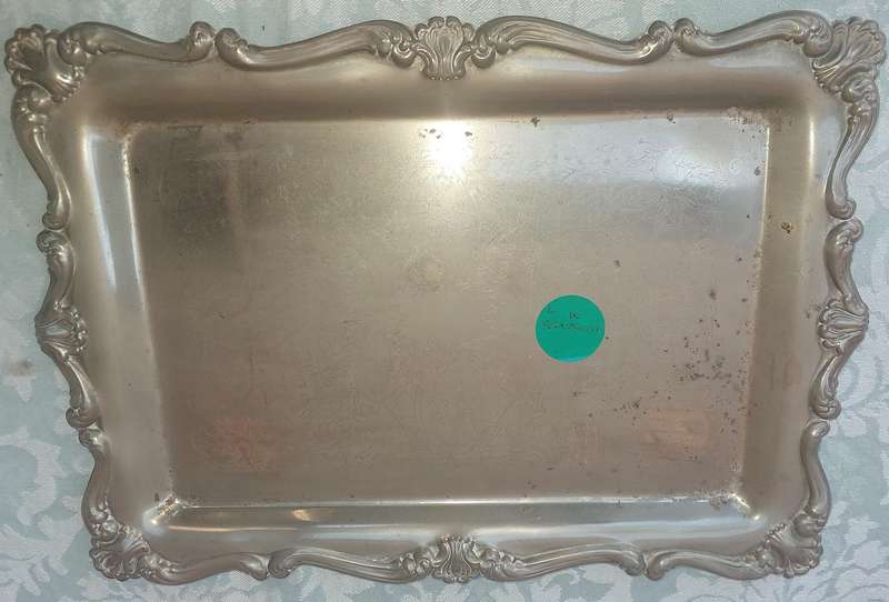 A vintage victorian silver plated serving tray sold as is