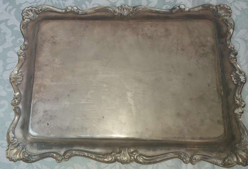 A vintage victorian silver plated serving tray sold as is