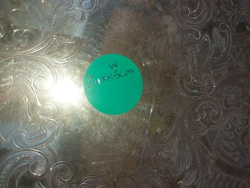 A VINTAGE LARGE SILVER PLATED EDWARDIAN SERVING TRAY WITH HANDLES SOLD AS IS