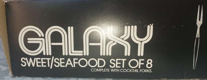A GALAXY SEAFOOD OR DESERT GLASS SET WITH FORKS SOLD AS IS