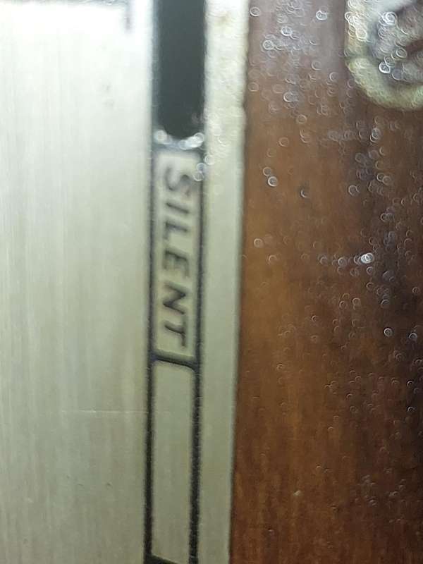 AN ANTIQUE PADESTAL CLOCK WITH THE WINDING KEYS MADE IN ENGLAND AND CHIMES SOLD AS IS