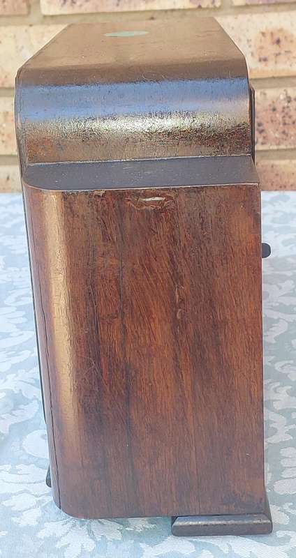 AN ANTIQUE PADESTAL CLOCK WITH THE WINDING KEYS MADE IN ENGLAND AND CHIMES SOLD AS IS