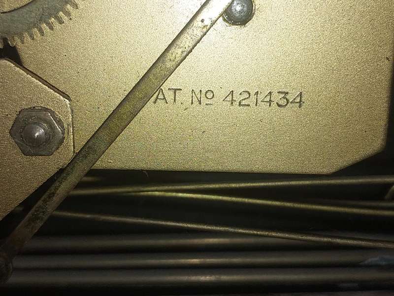 AN ANTIQUE PADESTAL CLOCK WITH THE WINDING KEYS MADE IN ENGLAND AND CHIMES SOLD AS IS