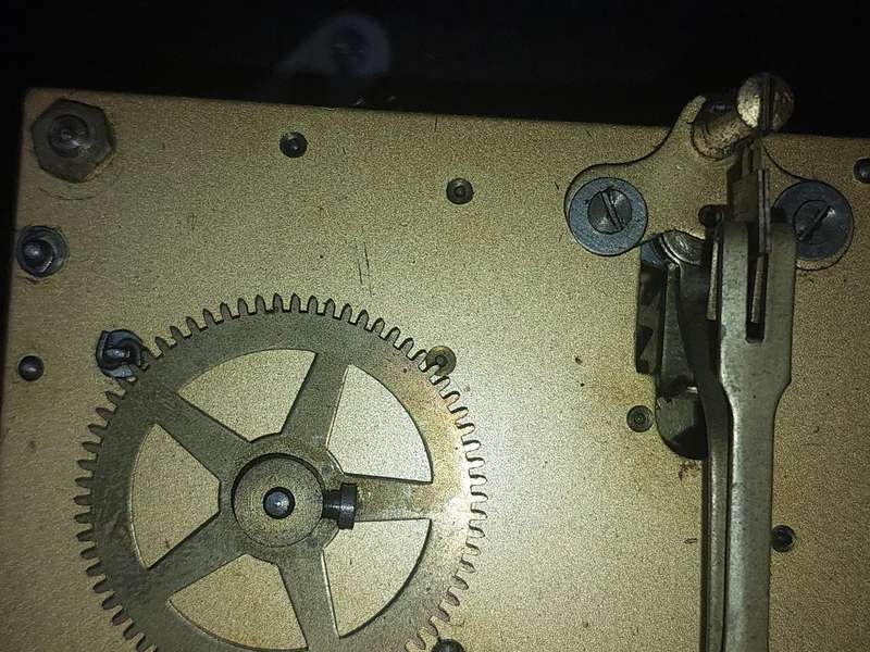 AN ANTIQUE PADESTAL CLOCK WITH THE WINDING KEYS MADE IN ENGLAND AND CHIMES SOLD AS IS