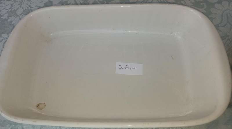A COLLECTION OF BASIC WHITE PORCELAIN SERVING PLATTERS SOLD AS IS