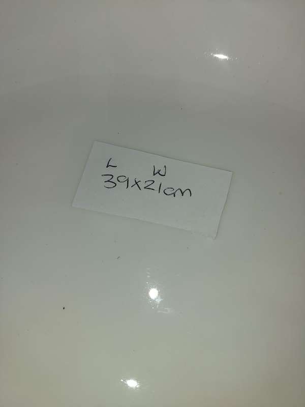 A COLLECTION OF BASIC WHITE PORCELAIN SERVING PLATTERS SOLD AS IS