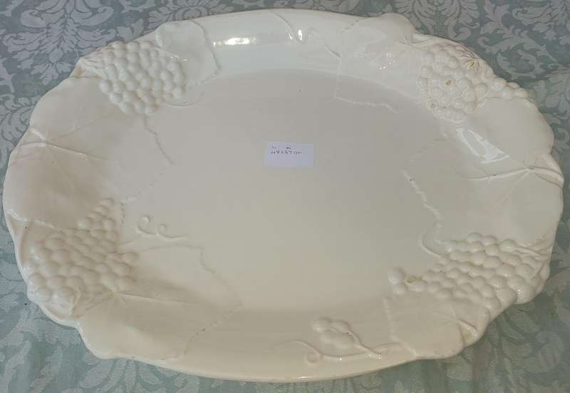 AN EXTRA LARGE PORCELAIN SERVING PLATTER WITH FRUIT DESIGN SOLD AS IS