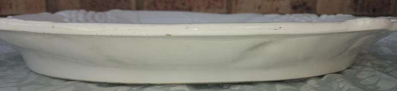 AN EXTRA LARGE PORCELAIN SERVING PLATTER WITH FRUIT DESIGN SOLD AS IS