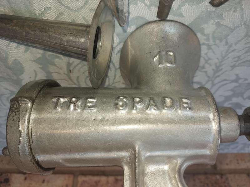 A VINTAGE TRE SPADE 10 MINCER WITH ALL THE COMPONENTS FOR SAUSAGE MAKING SOLD AS IS