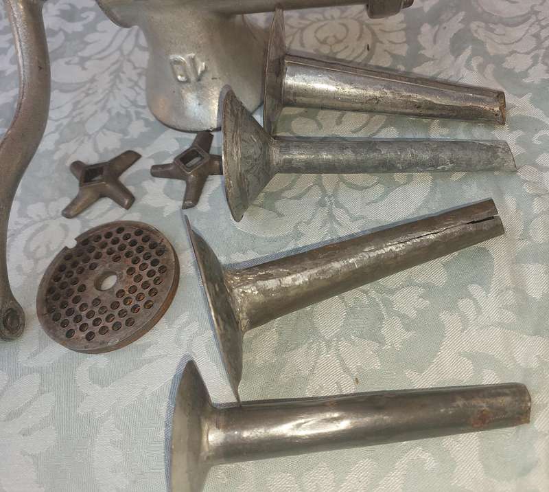 A VINTAGE TRE SPADE 10 MINCER WITH ALL THE COMPONENTS FOR SAUSAGE MAKING SOLD AS IS