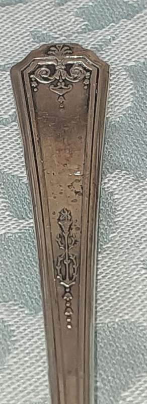 A VINTAGE SET OF STAINLESS STEEL CUTLERY SOLD AS IS