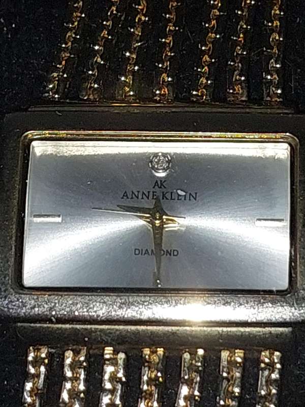 A COLLECTION OF FAMOUS BRANDED FASHION WATCHES SOLD AS IS