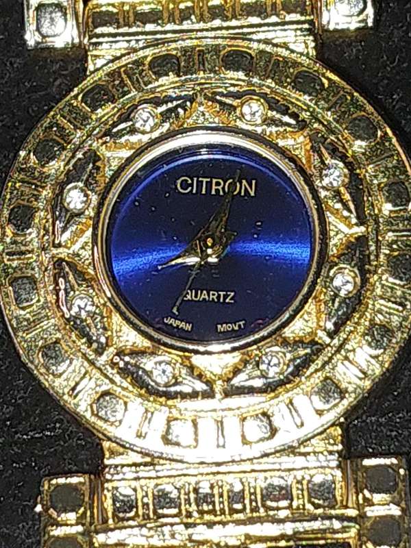 A COLLECTION OF FAMOUS BRANDED FASHION WATCHES SOLD AS IS