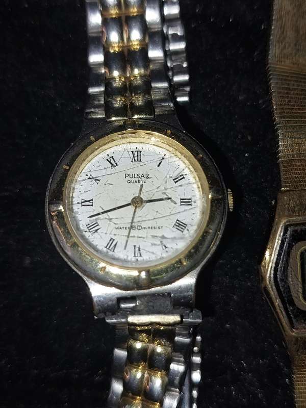 A VINTAGE PULSAR AND A DIGITAL GOLD PLATED CASIO WOMANS WATCHES SOLD AS IS