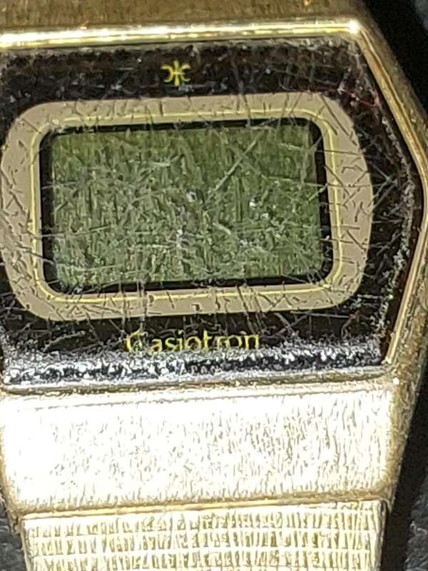 A VINTAGE PULSAR AND A DIGITAL GOLD PLATED CASIO WOMANS WATCHES SOLD AS IS