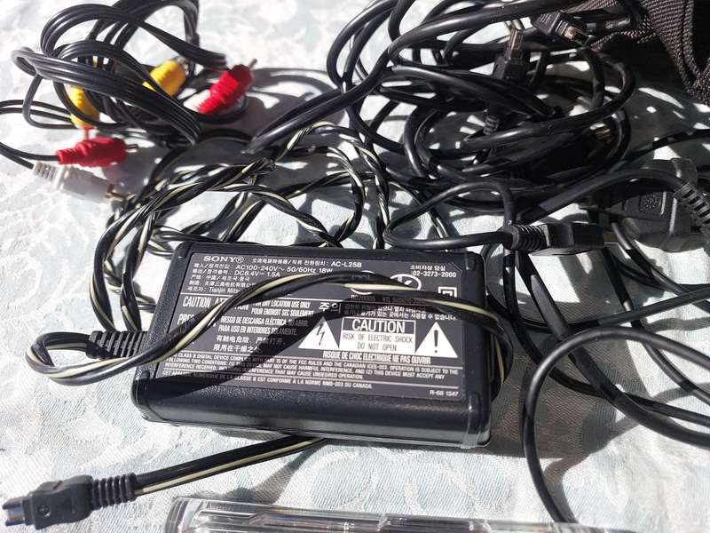 A SONY MODEL DCR-HC32E DIGITAL VIDEO CAMERA RECORDER IN WORKING ORDER WITH ALL CABLES , BATTERY AND