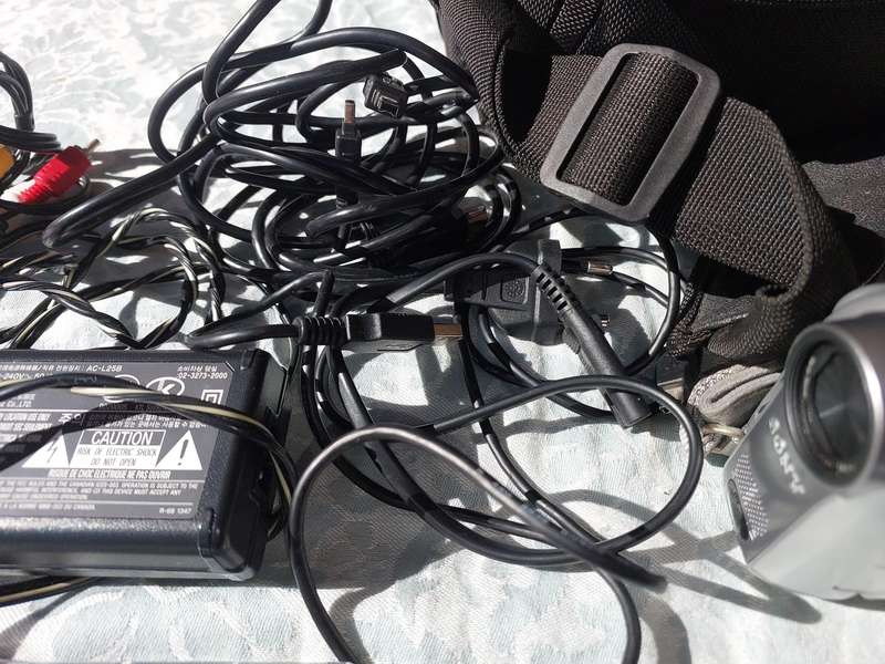 A SONY MODEL DCR-HC32E DIGITAL VIDEO CAMERA RECORDER IN WORKING ORDER WITH ALL CABLES , BATTERY AND
