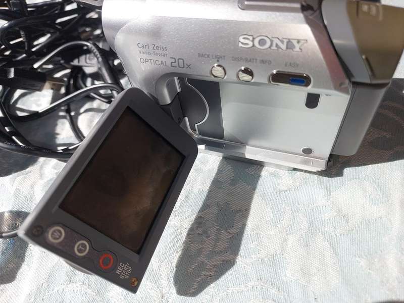 A SONY MODEL DCR-HC32E DIGITAL VIDEO CAMERA RECORDER IN WORKING ORDER WITH ALL CABLES , BATTERY AND