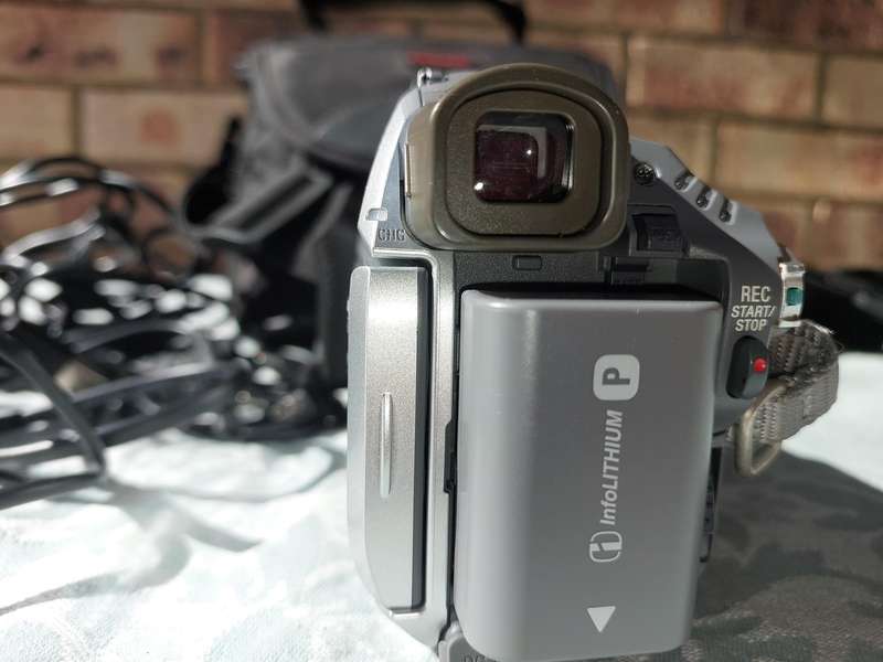 A SONY MODEL DCR-HC32E DIGITAL VIDEO CAMERA RECORDER IN WORKING ORDER WITH ALL CABLES , BATTERY AND
