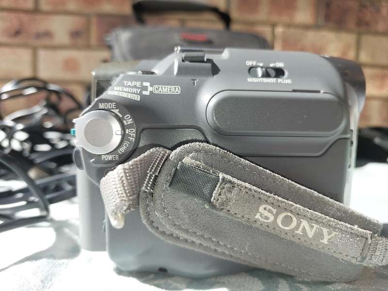 A SONY MODEL DCR-HC32E DIGITAL VIDEO CAMERA RECORDER IN WORKING ORDER WITH ALL CABLES , BATTERY AND