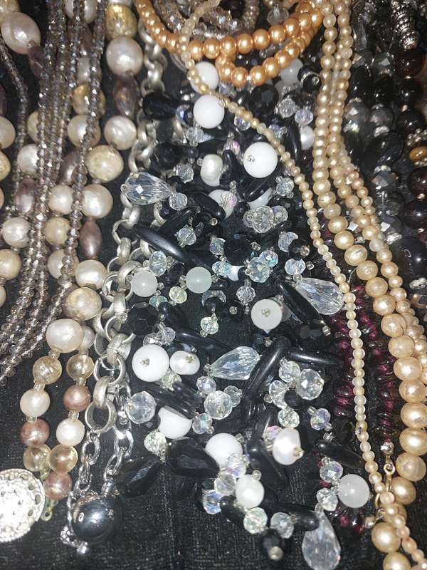 A COLLECTION OF QUALITY COSTUME NECKLACES SOLD AS IS