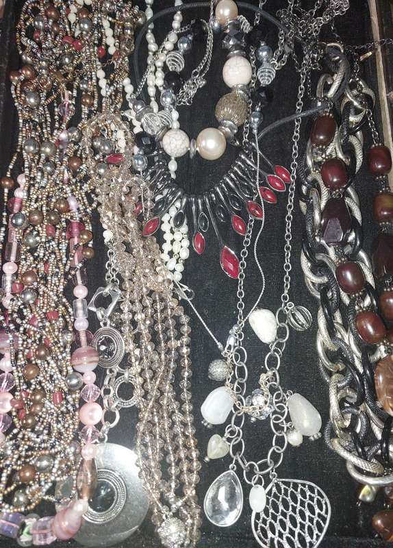 A COLLECTION OF COSTUME NECKLACES SOLD AS IS