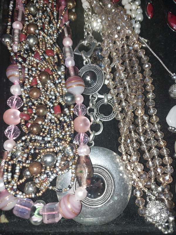 A COLLECTION OF COSTUME NECKLACES SOLD AS IS