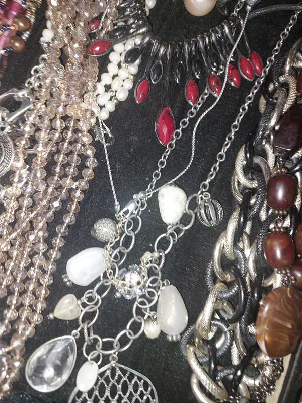 A COLLECTION OF COSTUME NECKLACES SOLD AS IS