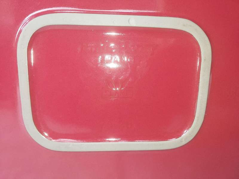 A EMILE HENRY RED CASSEROLE DISH MADE IN FRANCE SOLD AS IS