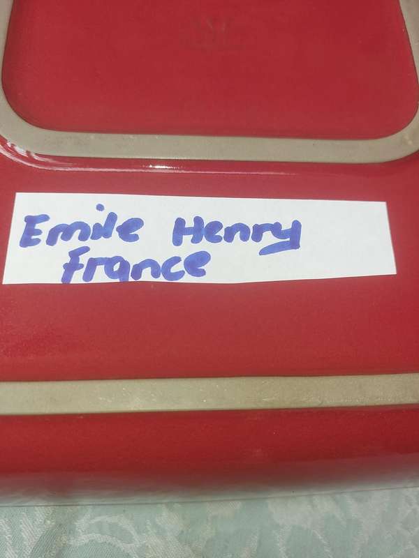 A EMILE HENRY RED CASSEROLE DISH MADE IN FRANCE SOLD AS IS