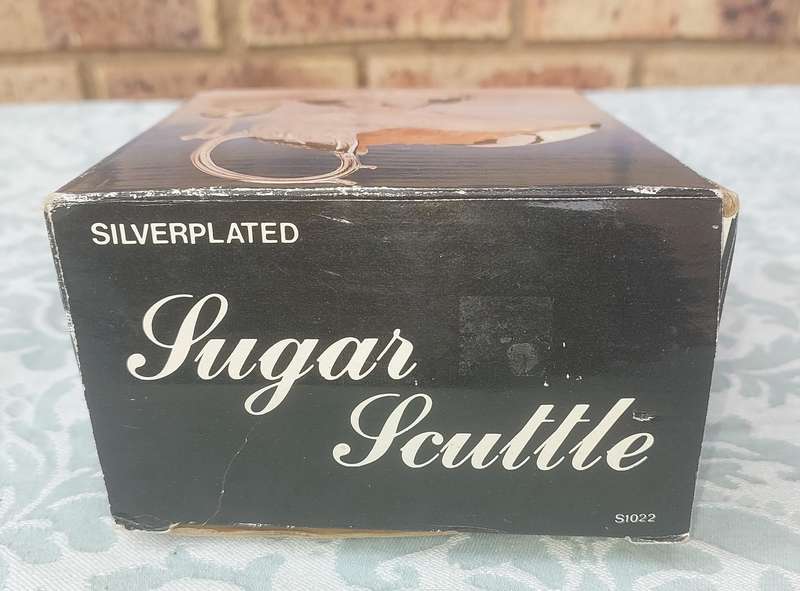 A sugar scuttle never used sold as is
