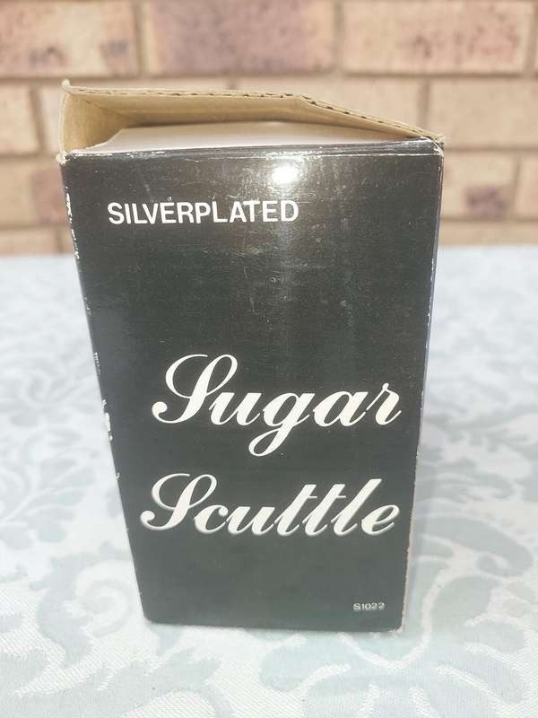 A sugar scuttle never used sold as is