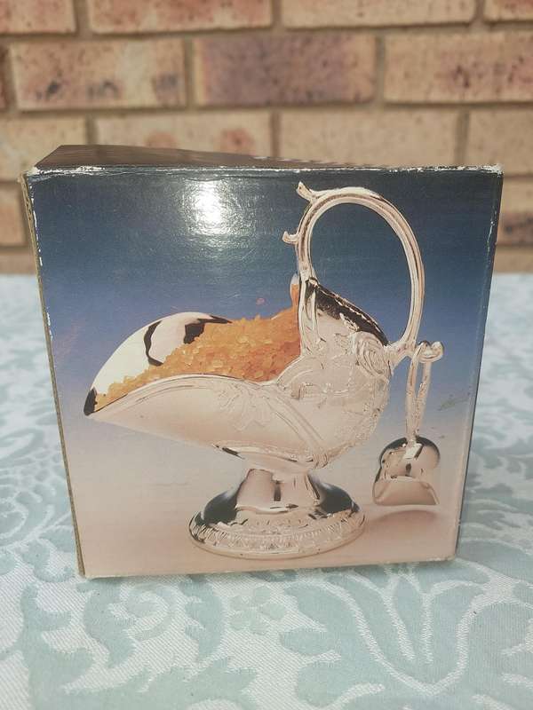 A sugar scuttle never used sold as is