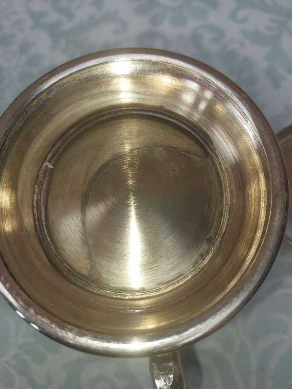 A COLLECTION OF BEER MUGS SOLD AS IS