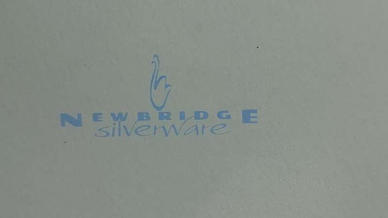 A NEWBRIDGE SILVER WARE SET OF 6 NAPKIN RINGS SOLD AS IS