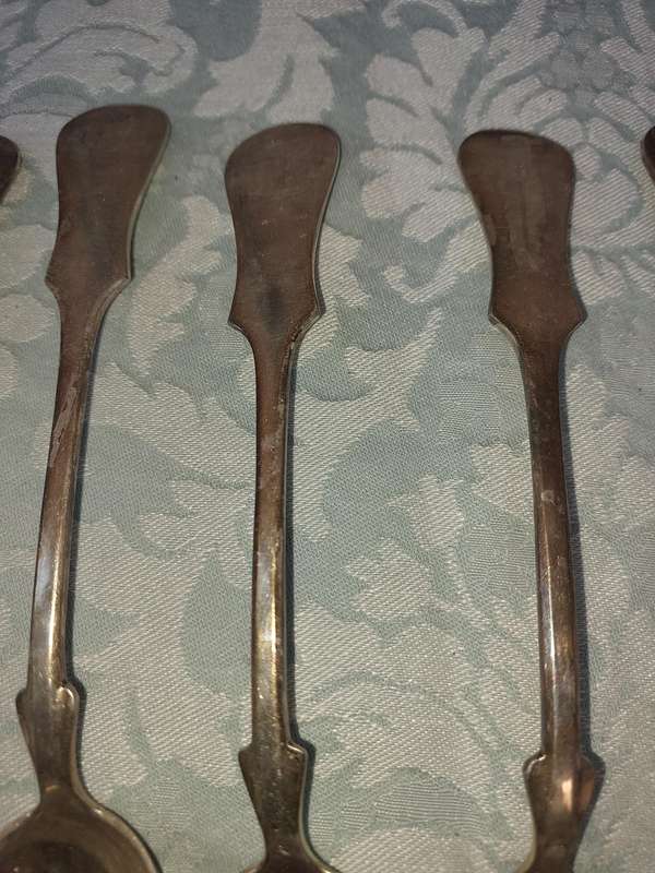 A SET OF 6 CHINA SILVER PLATE TABLE SPOONS SOLD AS IS