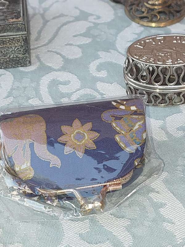 A COLLECTION OF JEWELRY BOXES AND LIPSTCK HOLDERS FOR THE DISCERNING LADY SOLD AS IS