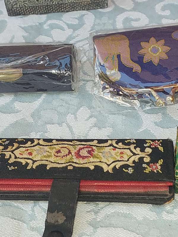 A COLLECTION OF JEWELRY BOXES AND LIPSTCK HOLDERS FOR THE DISCERNING LADY SOLD AS IS