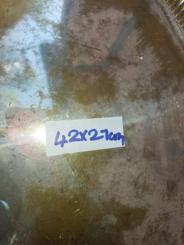 AN OVAL VICTORIAN SILVERPLATED ON BRASS TRAY SOLD AS IS