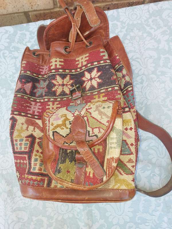 A BEATIFULL LEATHER WITH EMBROIDED ART WORK NAPSAK MADE BY KILIM ART IN TURKEY