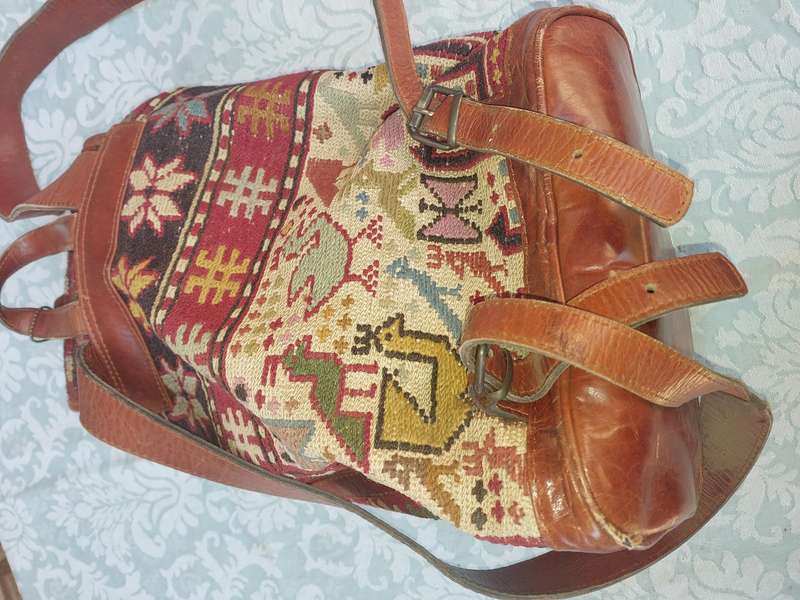 A BEATIFULL LEATHER WITH EMBROIDED ART WORK NAPSAK MADE BY KILIM ART IN TURKEY